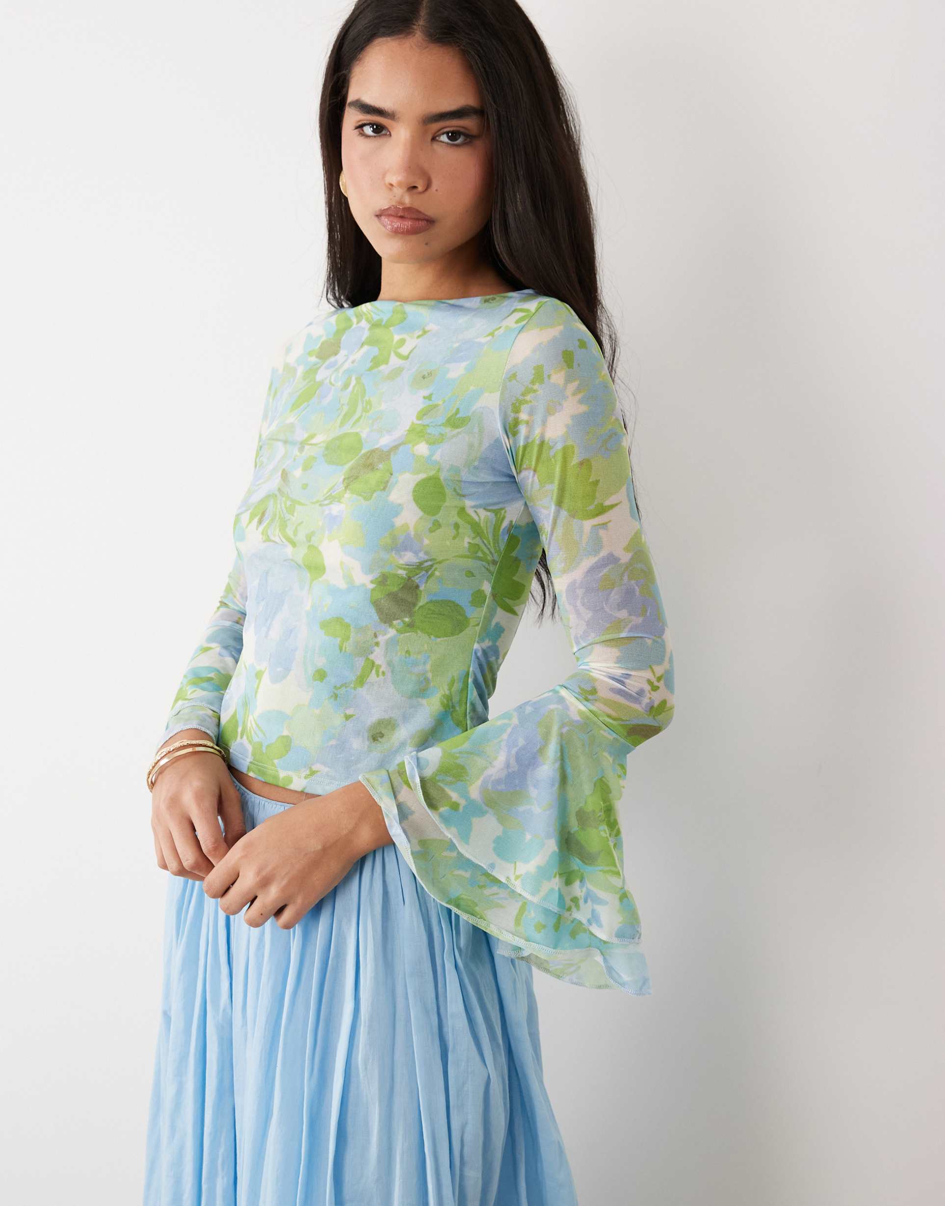 asos design slinky mesh long sleeve top with flare sleeve detailing in blue floral