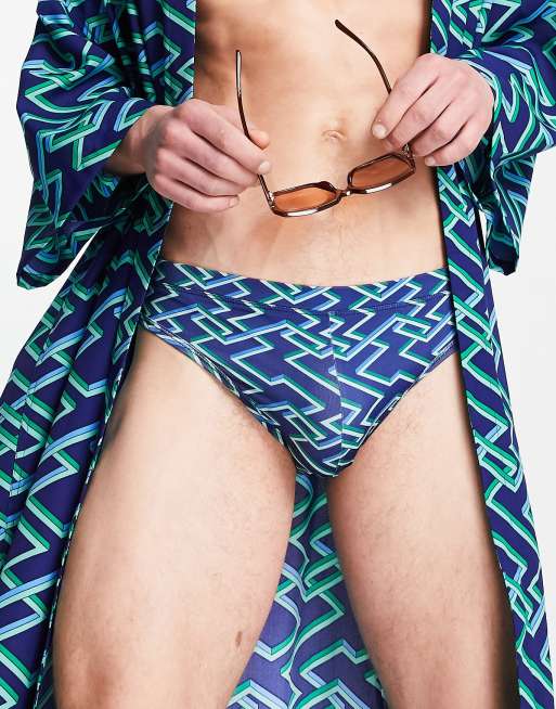 ASOS DESIGN - Slip da bagno blu navy con stampa geometrica in coordinato