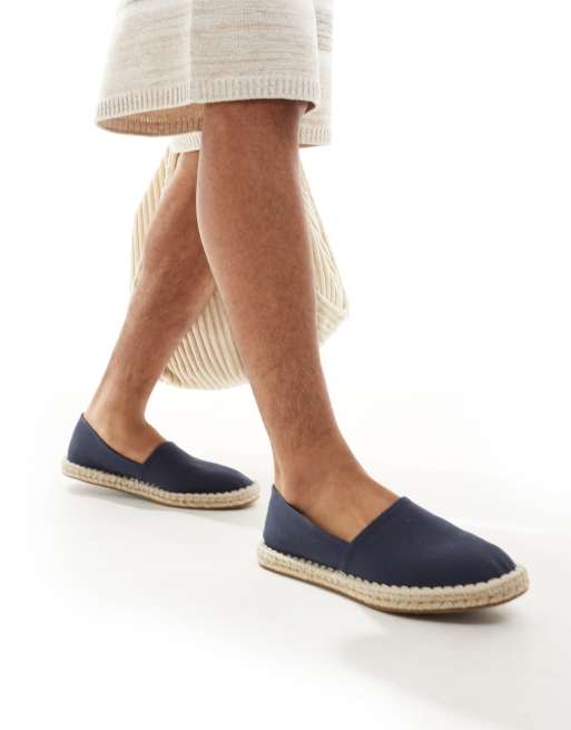 ASOS DESIGN slip on espadrilles in navy canvas