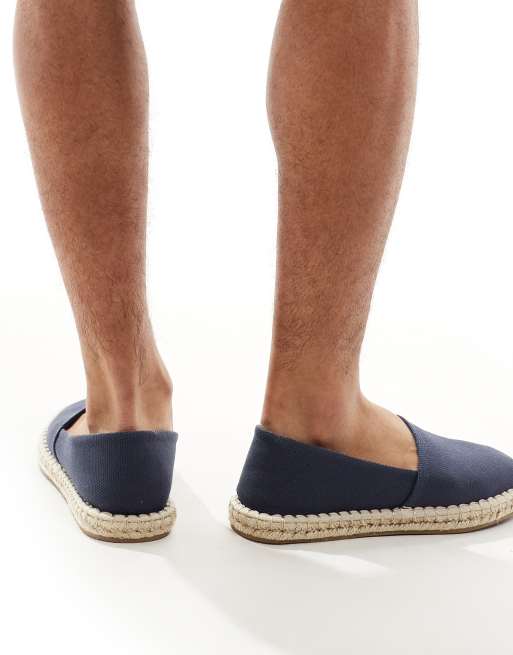 ASOS DESIGN slip on espadrilles in navy canvas