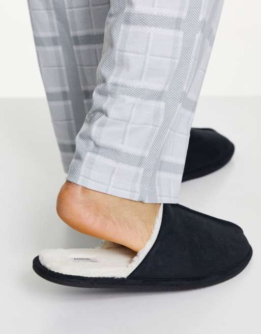 ASOS DESIGN slip on slippers in black with cream faux fur lining