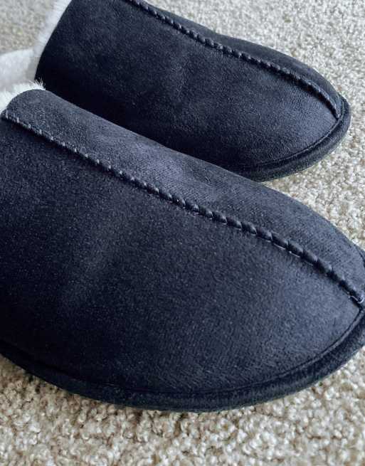 ASOS DESIGN slip on slippers in navy with cream faux fur lining