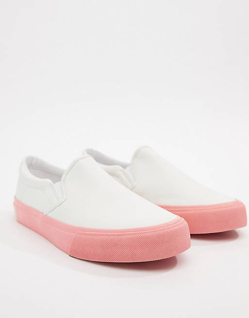 ASOS DESIGN slip on sneakers in white with pink sole