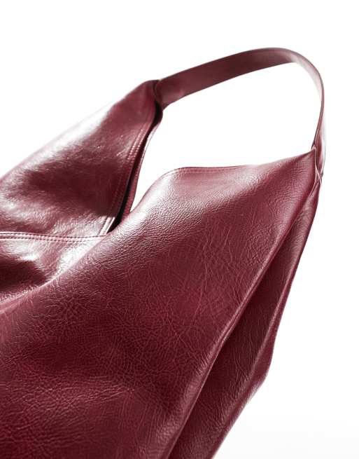 ASOS DESIGN slouch tote bag with crossover panel detail in burgundy ASOS