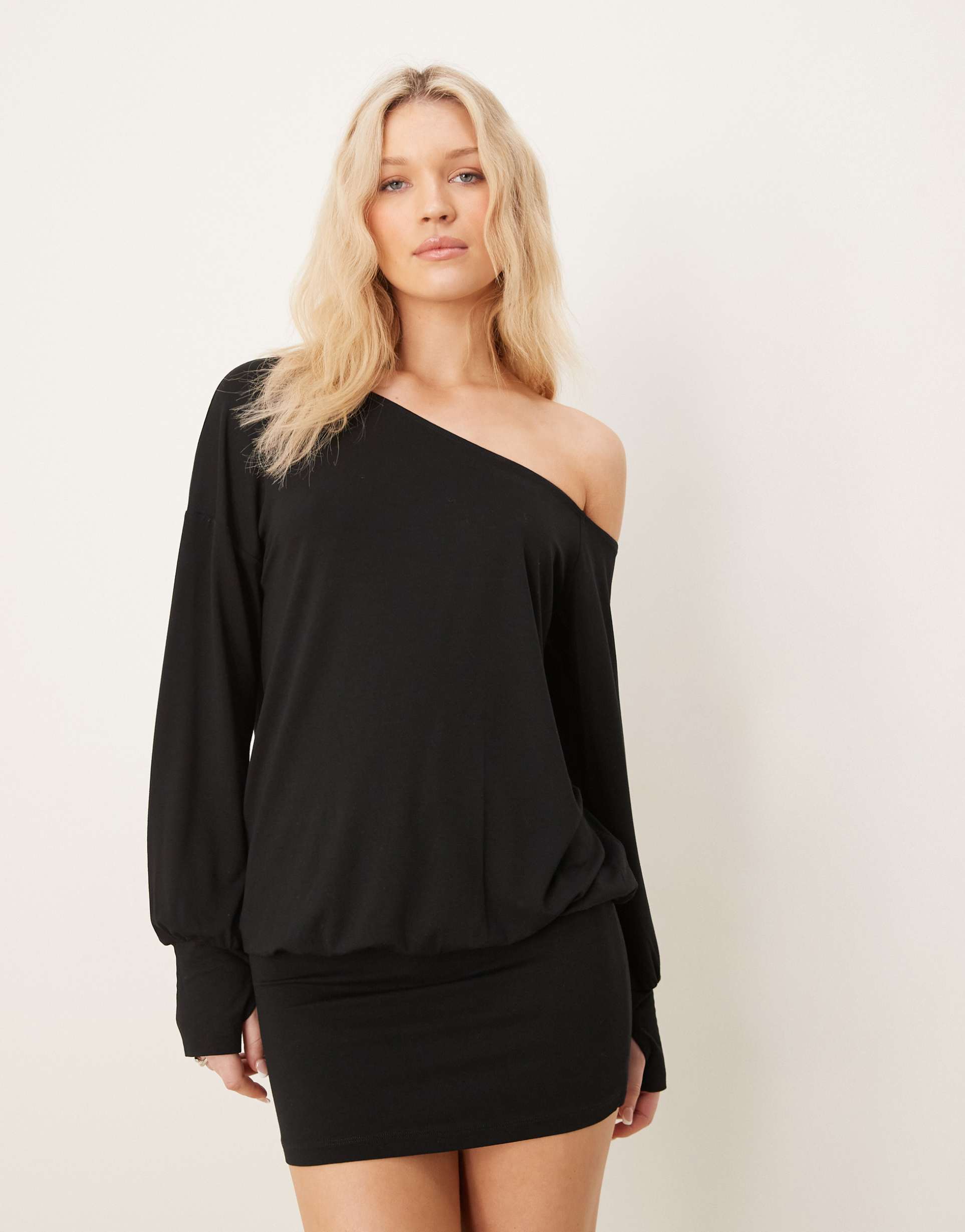 asos design slouchy mini dress with thumbholes and asymmetric neckline in black