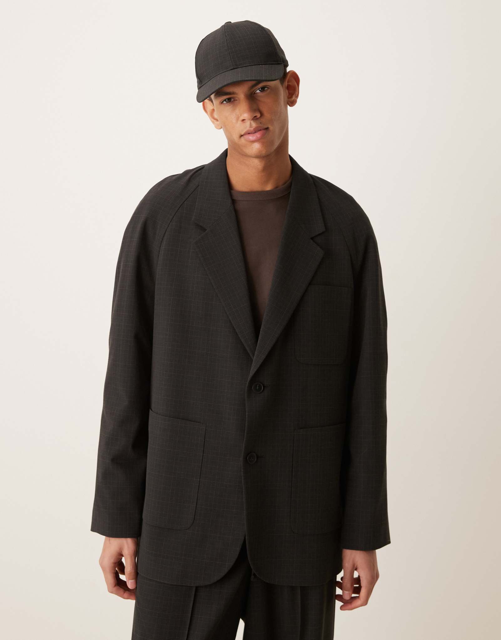 Дизайнерский пиджак с напуском от ASOS в черную мелкую клетку