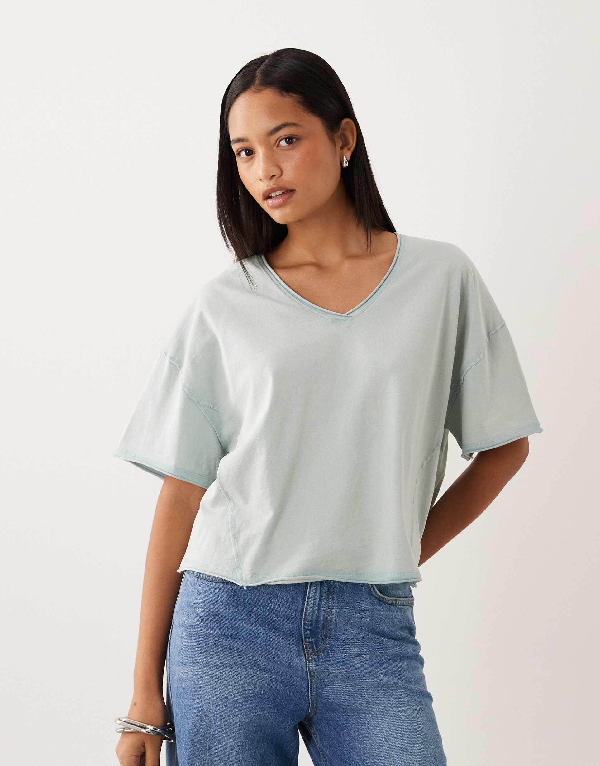 asos design slouchy v neck t-shirt in washed blue