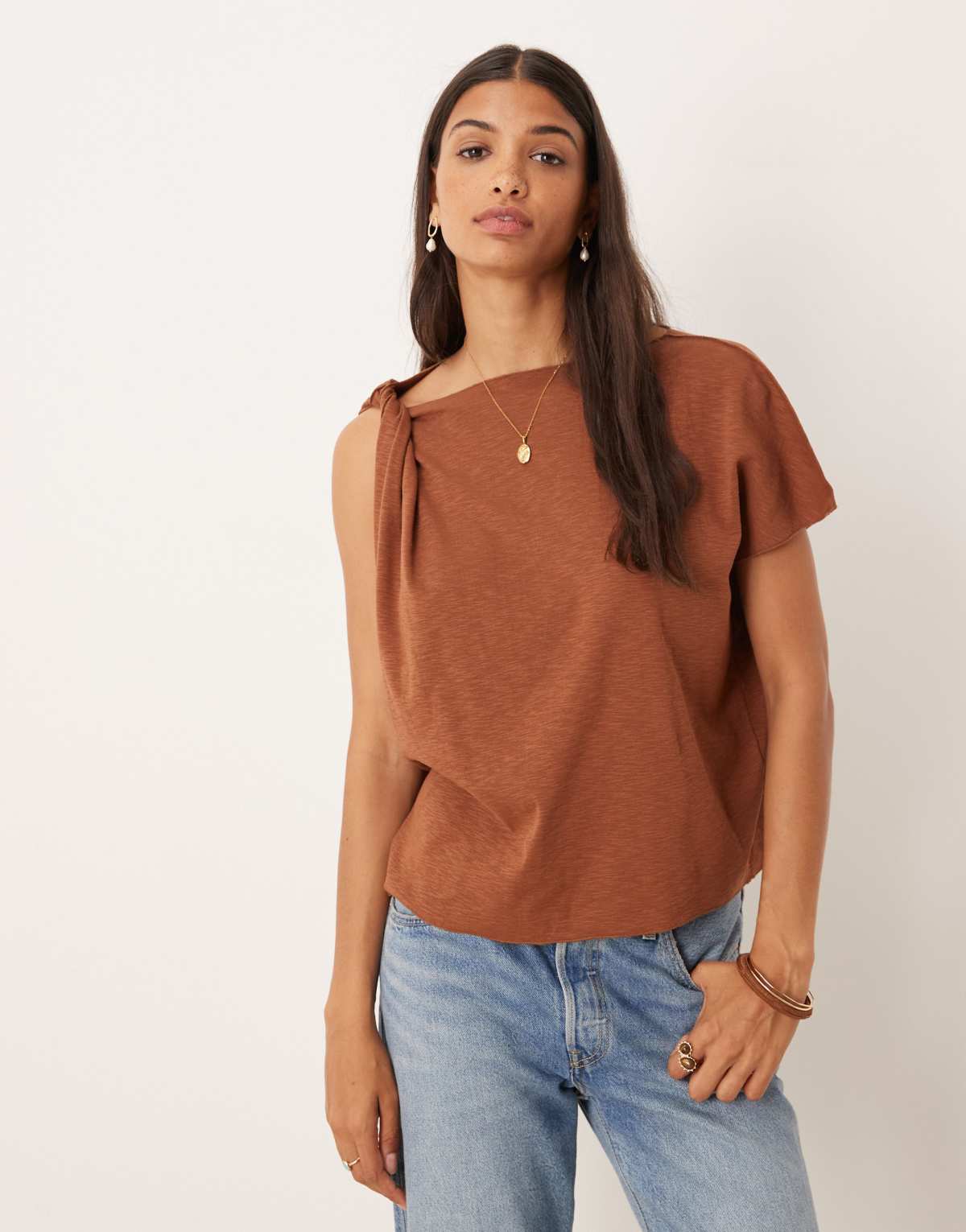 ASOS DESIGN slubby asymmetrical knot sleeve t-shirt in brown