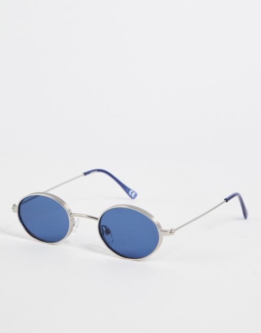 ASOS DESIGN - Sølvfarvede små runde 90'er-solbriller med bred indfatning og blå glas 