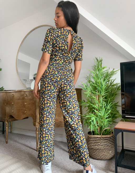 ASOS DESIGN – Småblommig jumpsuit med snurrad knut framtill