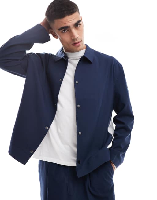 ASOS DESIGN - Smal, elegant træningsjakke med hvide sidestriber i marineblå - Del af sæt