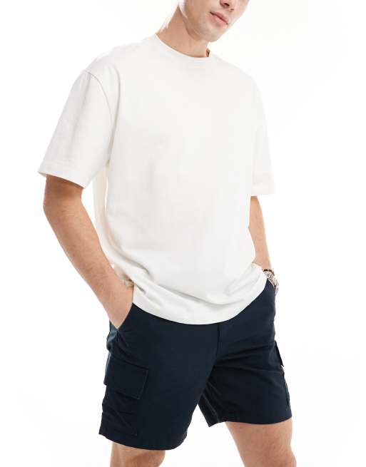 ASOS DESIGN - Smalle cargoshort met normale lengte met patch in marineblauw