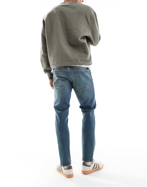 ASOS DESIGN - Smalle jeans in mid-wash blauw met tint, 3 van 5