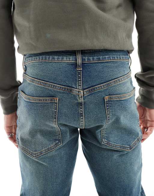 ASOS DESIGN - Smalle jeans in mid-wash blauw met tint, 4 van 5