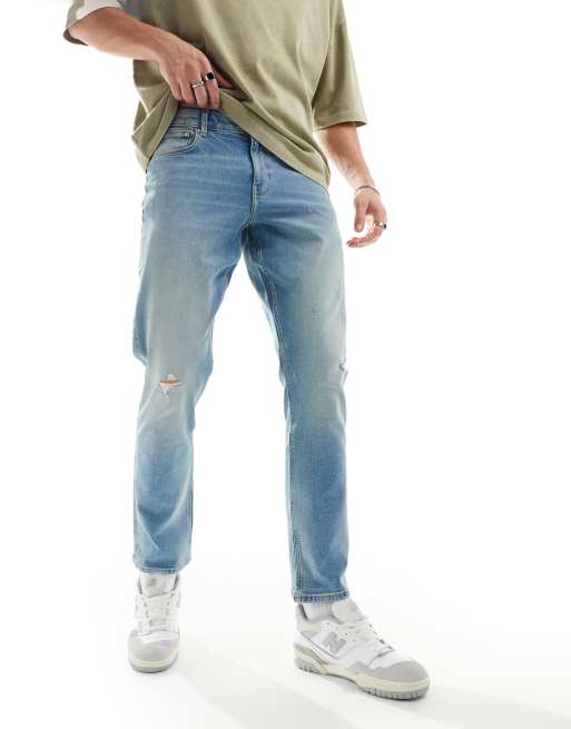 ASOS DESIGN - Smalle jeans med stretch og sliddetaljer i lyseblå vask
