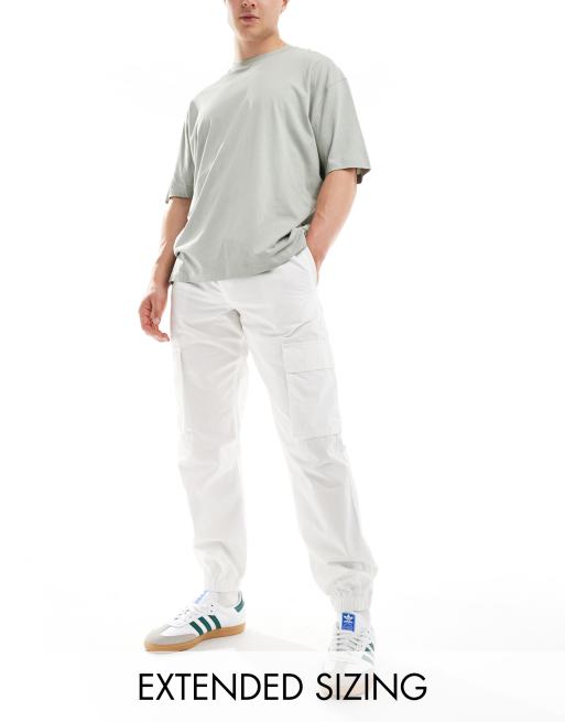 ASOS DESIGN - Smaltoelopende broek met elastische taille in wit