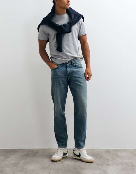 ASOS DESIGN smaltoelopende jeans in donkerblauwe wassing - view 1