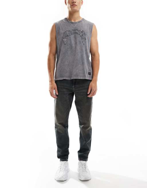 ASOS DESIGN - Smaltoelopende jeans in getint blauw met donkere wassing