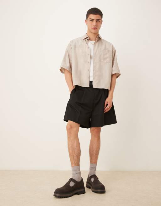 ASOS DESIGN smart bermuda shorts with front pleat and belt detail in black 