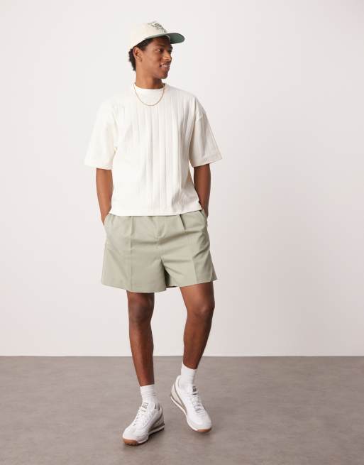 ASOS DESIGN smart bermuda shorts with front pleat and belt detail in green 
