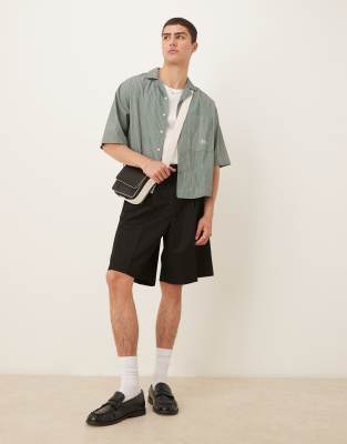 ASOS DESIGN smart bermuda shorts with front pleat in black - view 1