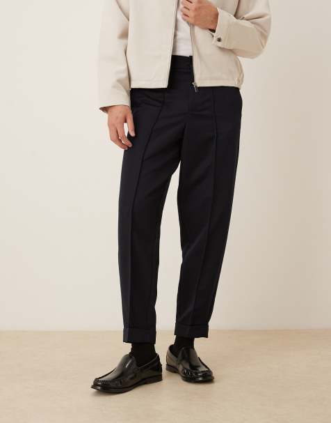 ASOS DESIGN smart carrot fit trousers with turnup hems in navy - view 1