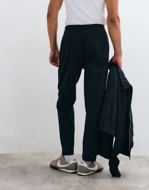 ASOS DESIGN smart co-ord carrot fit trousers in black seersucker, 5 of 5