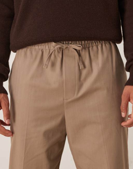 ASOS DESIGN smart cotton rich pull on relaxed tapered trousers in dark stone, 4 of 5