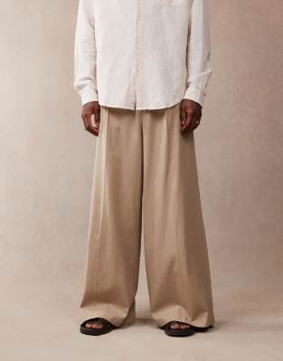 ASOS DESIGN smart extreme wide leg linen blend pants with front pleat in dark stone
