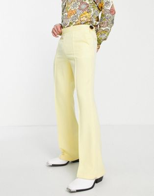 ASOS DESIGN smart flared trousers in muted yellow