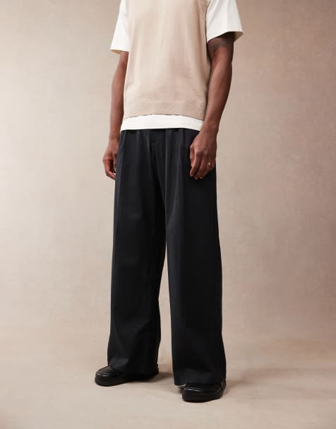 ASOS DESIGN smart loose leg linen blend pants with front pleat in black - view 1