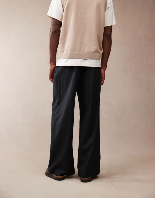 ASOS DESIGN smart loose fit linen blend pants with front pleat in black