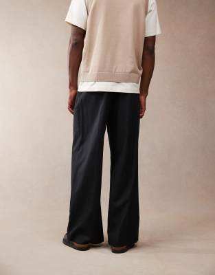 ASOS DESIGN smart loose fit linen blend pants with front pleat in black