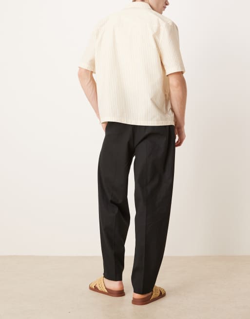 ASOS DESIGN oversized tapered linen blend dress pants with front pleats in black
