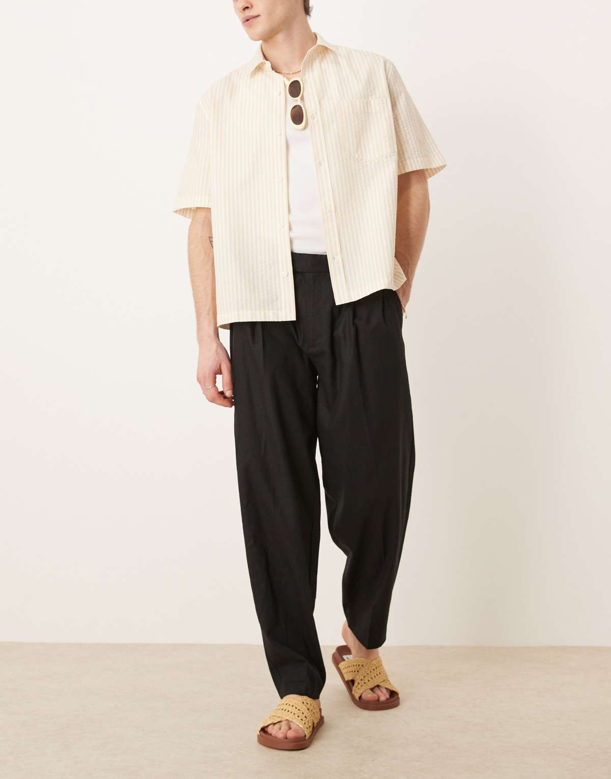 ASOS DESIGN smart oversized tapered linen blend trousers with front pleat in black