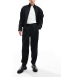 [ASOS DESIGN] ASOS DESIGN smart oversized tapered pants in black satin with elasticated waist (part of a set) S BLACK