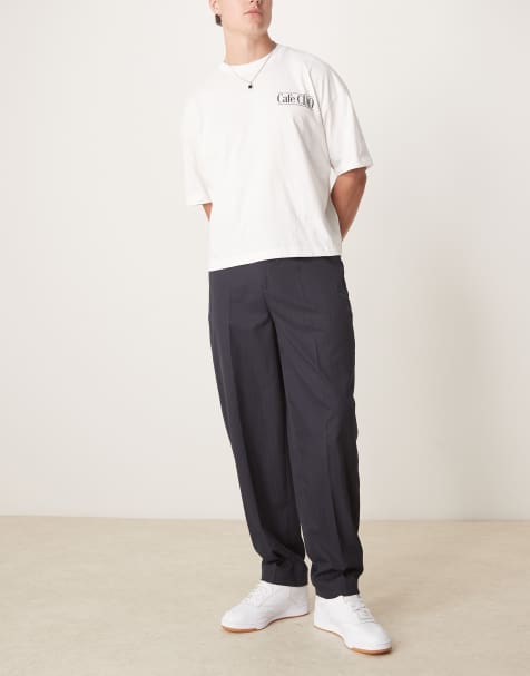 ASOS DESIGN smart oversized tapered pants in navy pinstripe - view 1