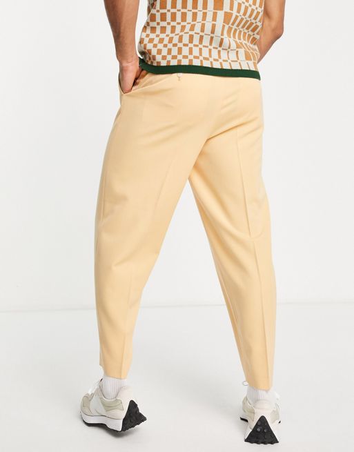 ASOS DESIGN smart slim pants in retro monogram in ecru