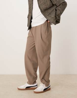 ASOS DESIGN smart oversized tapered pants with deep pleat in tan-Neutral