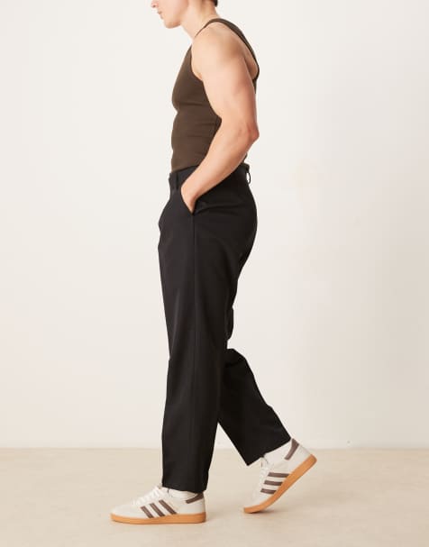 ASOS DESIGN smart oversized tapered pants with front pleat in black - view 1