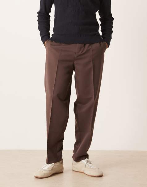 ASOS DESIGN smart oversized tapered pants with full elasticated waist in brown - view 1