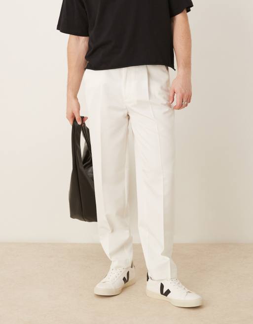 ASOS DESIGN – Elegante, schmal zulaufende Oversize-Hose in Weiß mit Bundfalten