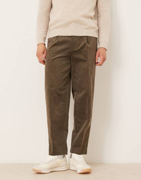 ASOS DESIGN smart pleated cotton rich oversized tapered trousers in brown corduroy - view 1