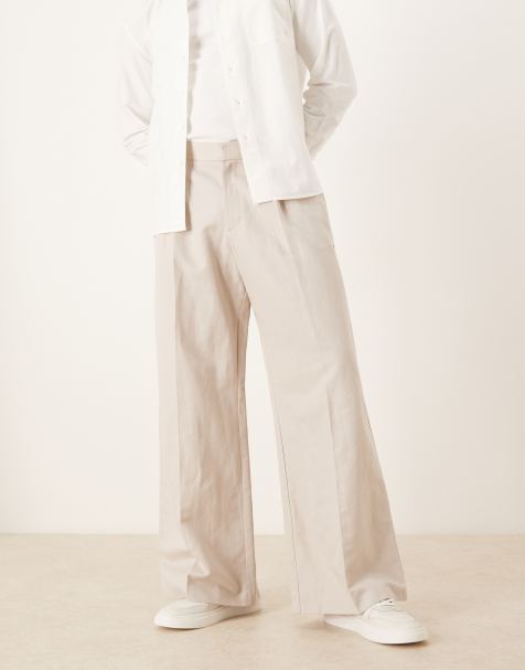 ASOS DESIGN smart pleated linen rich loose leg pants in stone - view 1