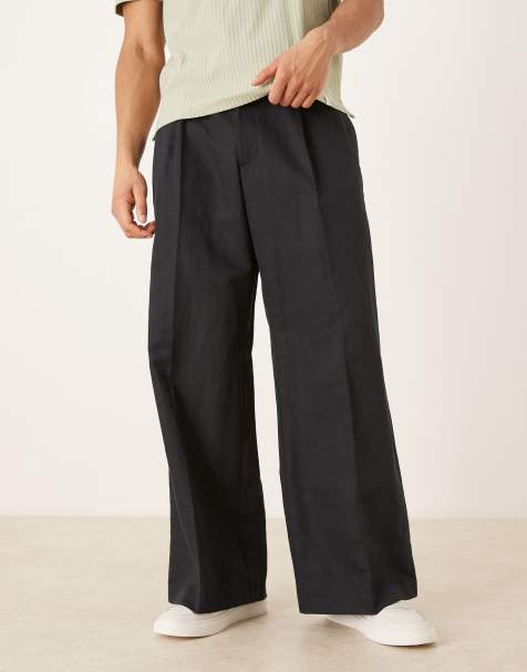 ASOS DESIGN smart pleated linen rich loose leg trousers in black - view 1