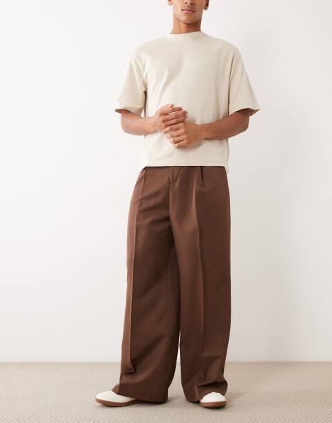 ASOS DESIGN smart pleated loose leg pants in dark brown - view 1