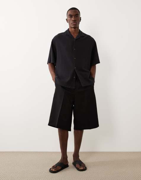 ASOS DESIGN smart pleated oversized bermuda shorts in black - view 1
