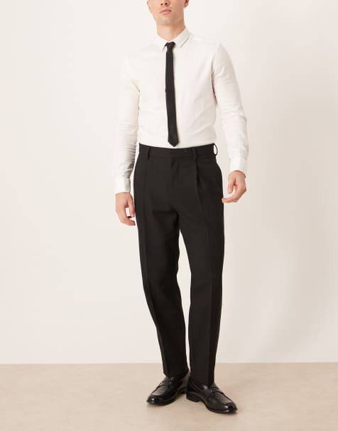 ASOS DESIGN smart pleated relaxed tapered leg trousers and pocket detail in black herringbone wool mix