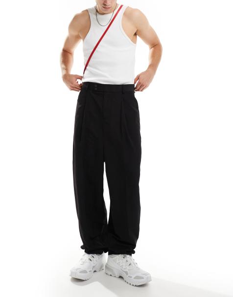 ASOS DESIGN smart relaxed barrel leg trousers in black with half elasticated waist - view 1