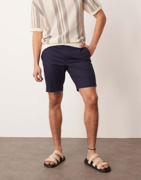 ASOS DESIGN smart slim fit chino shorts with mitred tab in navy - view 1